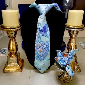 Beautiful powder blue necktie with matching pocket square by Tietanica